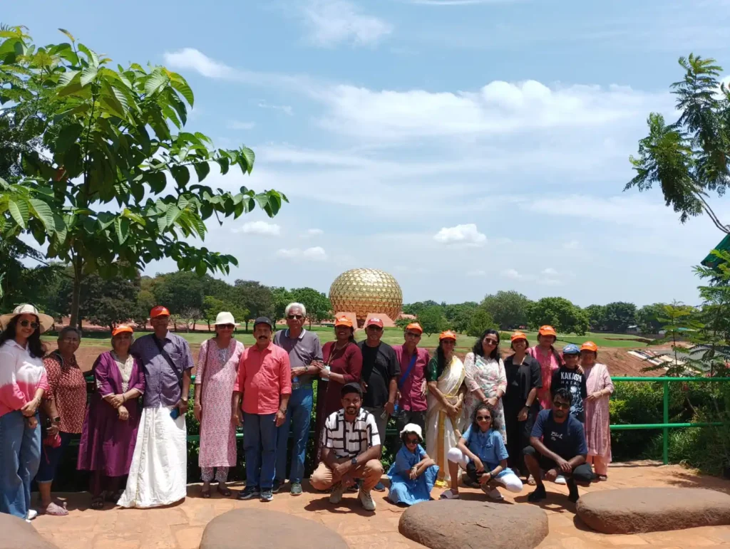 Tourists posing at famous Chennai attraction