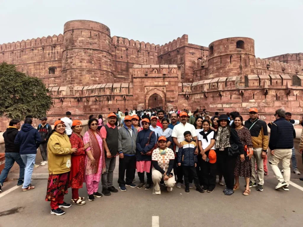 Travel group in front of Red Fort Delhi sightseeing